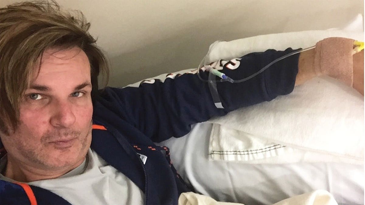Selfie of Rikki Rockett getting treatment for cancer.