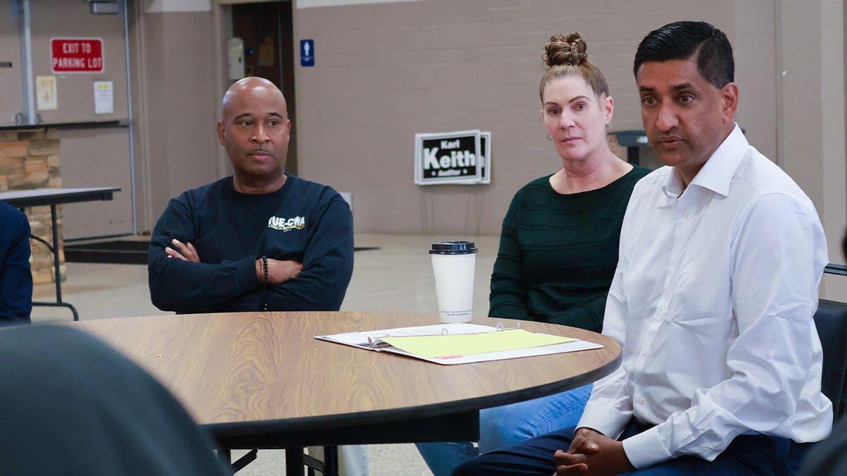 Sam Sanders (L), President of IUE-CWA Local 84775, listens to Rep. Ro Khanna, D-Calif., speak during a roundtable discussion in Dayton, Ohio on Oct. 6, 2026.