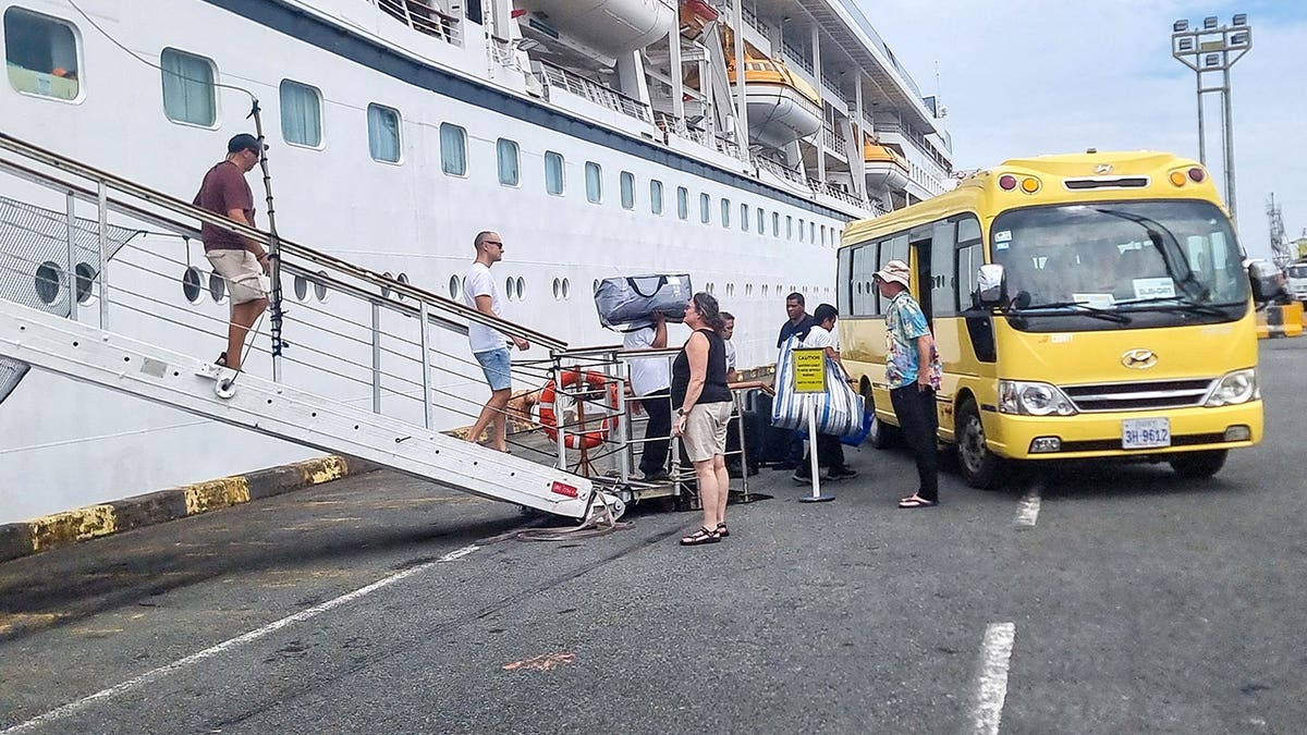Passengers leaving MV Odyssey