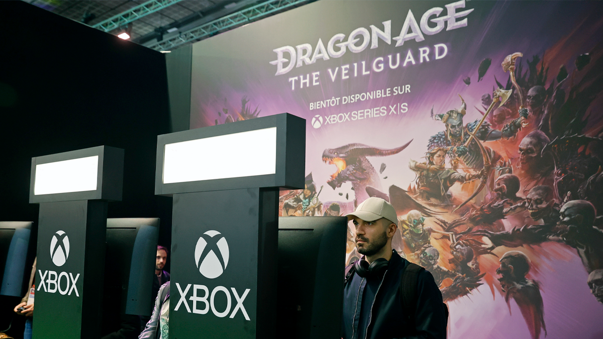 A gamer plays the video game 'Dragon age the veilguard' developed by BioWare and published by Electronic Arts on Xbox console during the 'Paris Games Week' on October 22, 2024.
