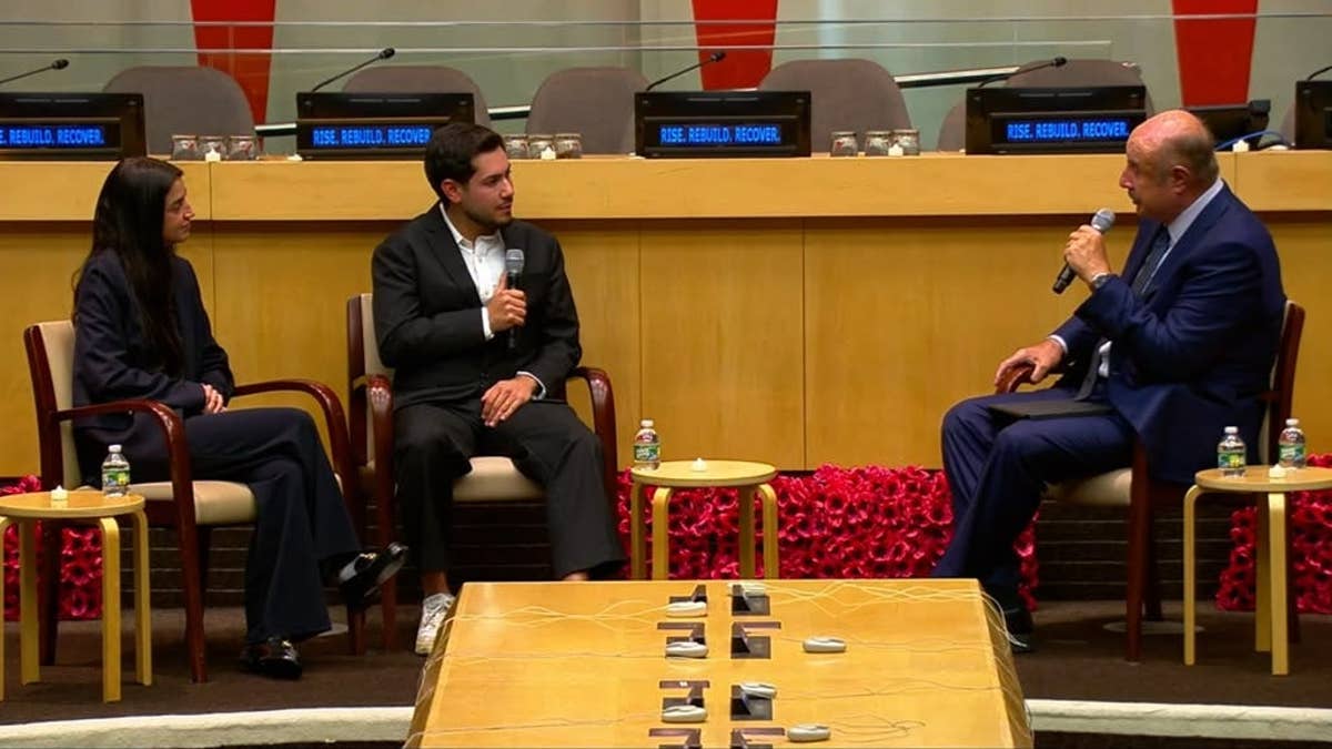 Freed Israeli hostage Eliya Cohen and his wife, Nova massacre survivor Ziv Abud, speak with Dr. Phil McGraw during Israel’s Oct. 7 commemoration at U.N. headquarters in New York, Oct. 6, 2026.