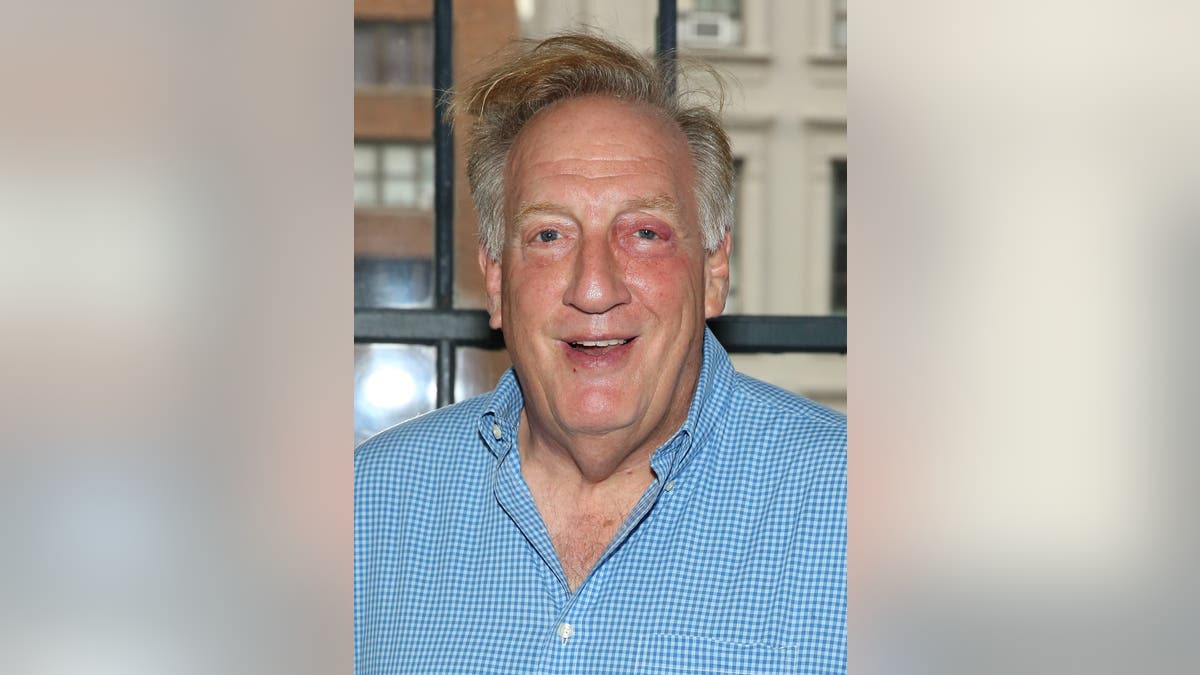 Alan Zweibel poses in a green room before Celebrity Autobiography.
