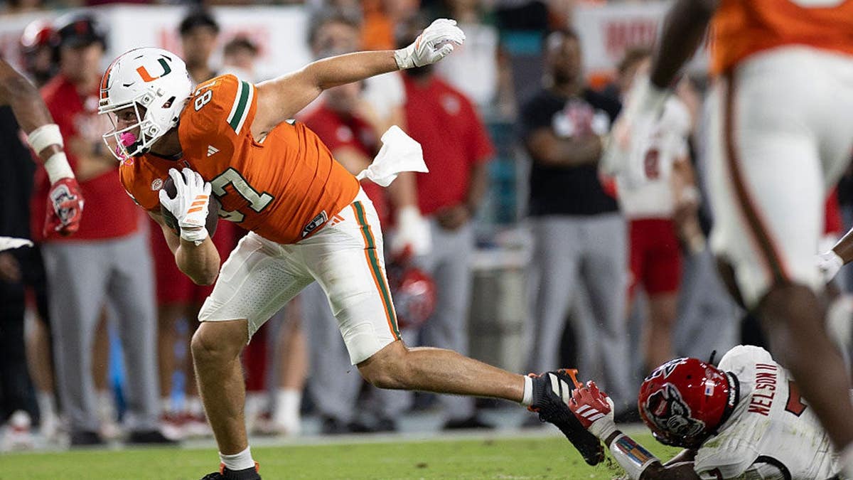 Alex Bauman runs with the ball during a game against NC State.