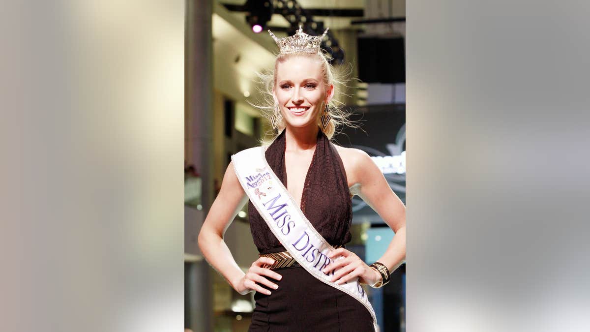 Allyn Rose, Miss District of Columbia, stands at the 2013 Miss America Pageant meet and greet fashion show.
