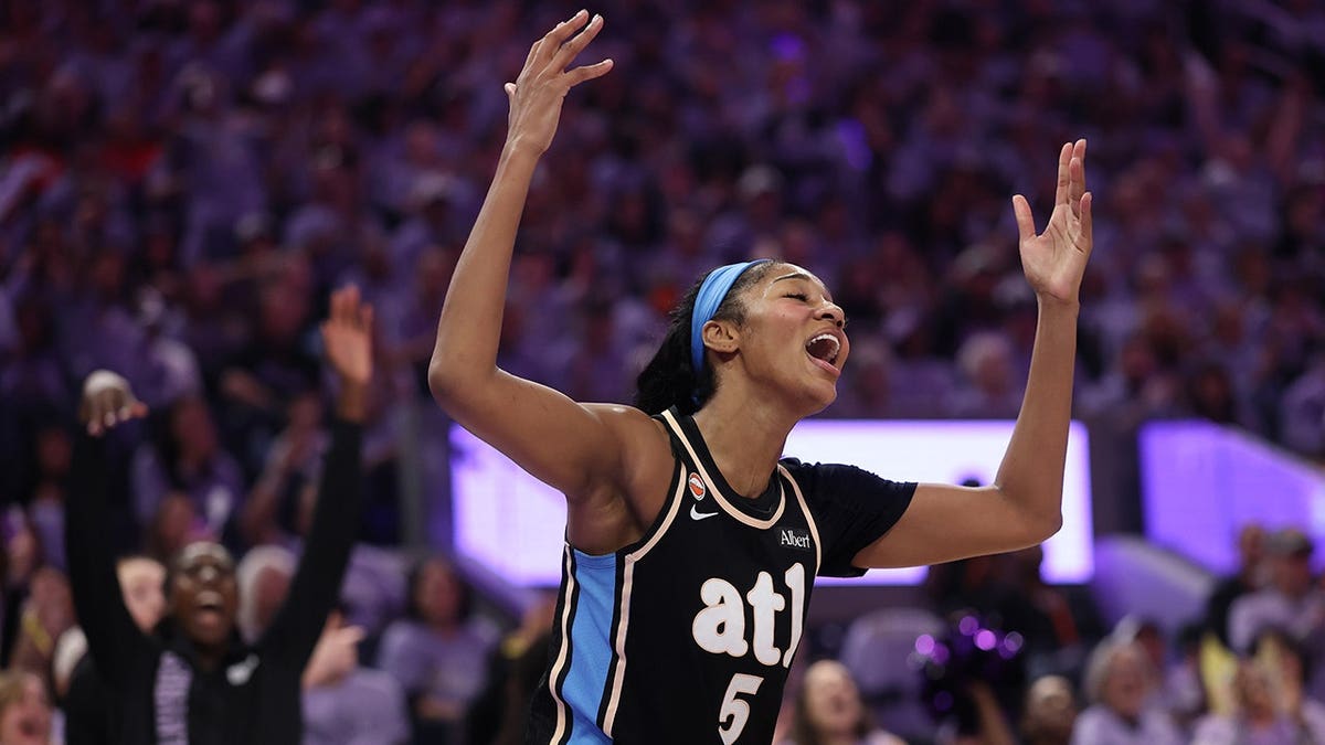 Angel Reese of the Atlanta Dream reacts during the second quarter of a WNBA Finals game.