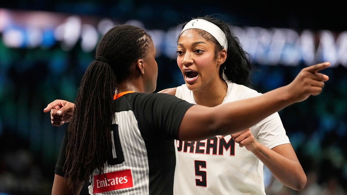 Angel Reese talks to a referee during Game 4 of the WNBA finals in Atlanta.