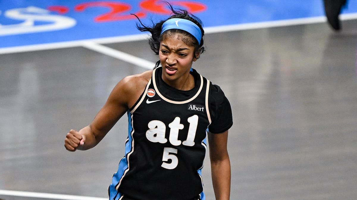 Angel Reese reacts during Game 3 of the WNBA Finals at State Farm Arena.