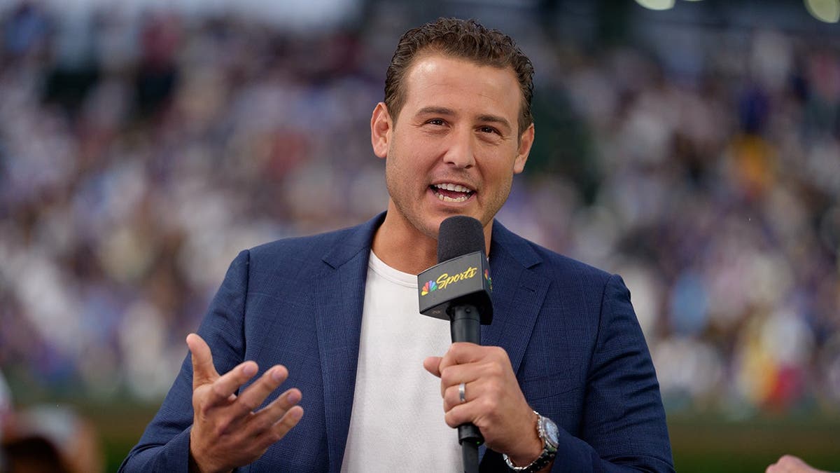 Anthony Rizzo stands during a pregame NBC Sports segment at Wrigley Field.