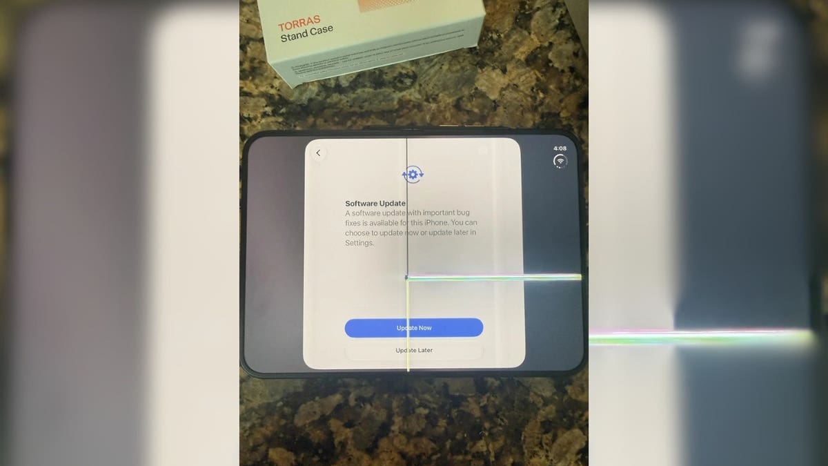 An iPhone Duo with a cracked screen