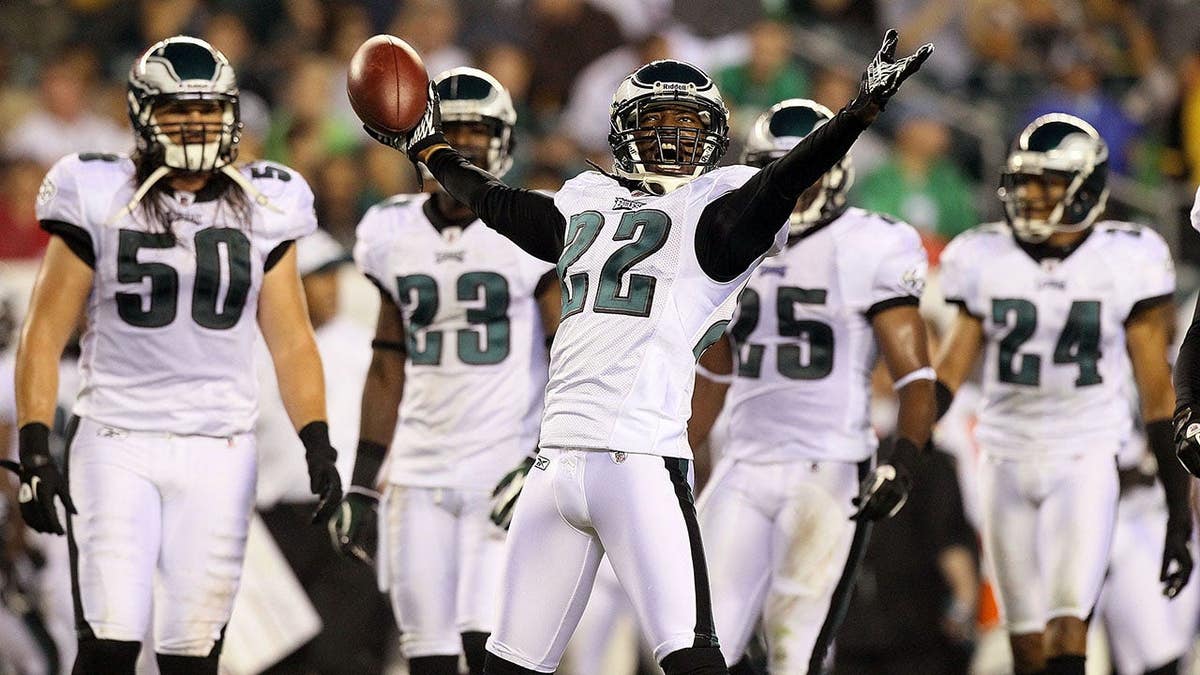 Asante Samuel celebrates after an interception against the Cleveland Browns.