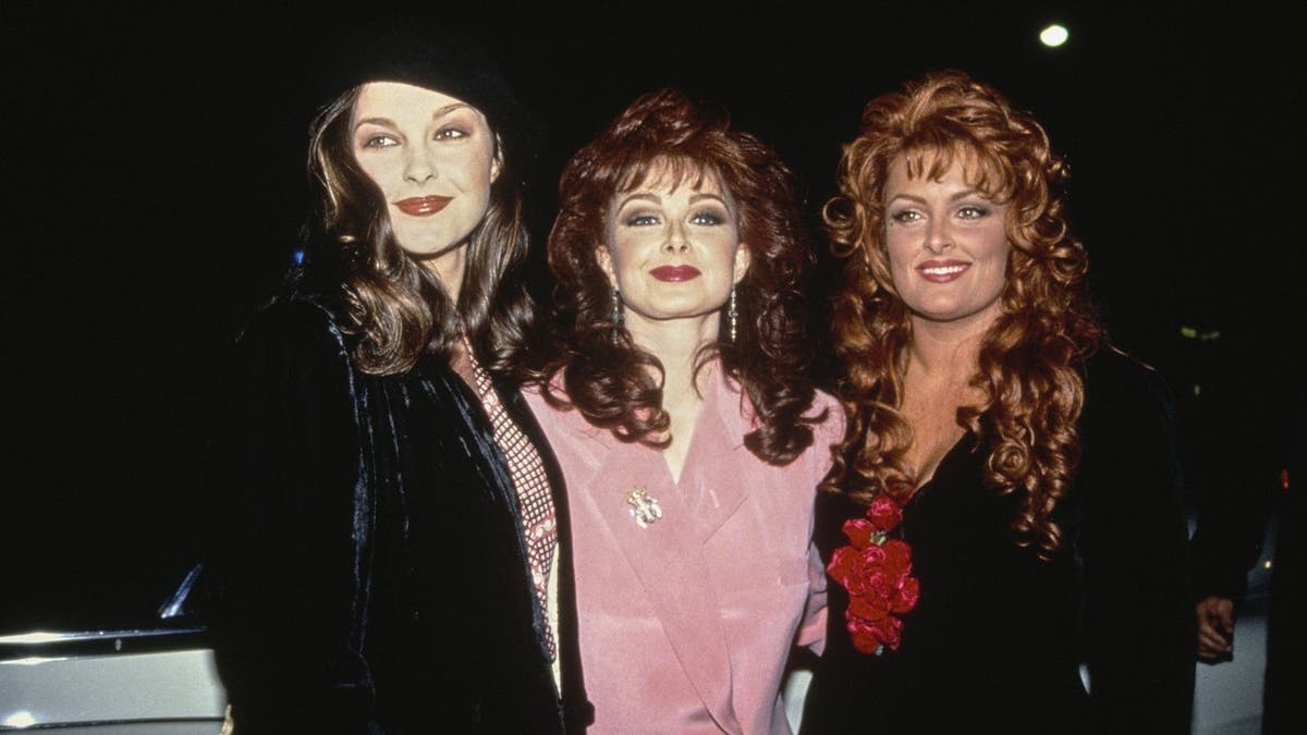 Ashley Judd, Naomi Judd and Wynonna Judd pose at The Ritz Carlton in Pasadena.