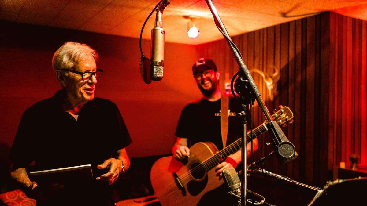 Jimmy and Bob stand together.