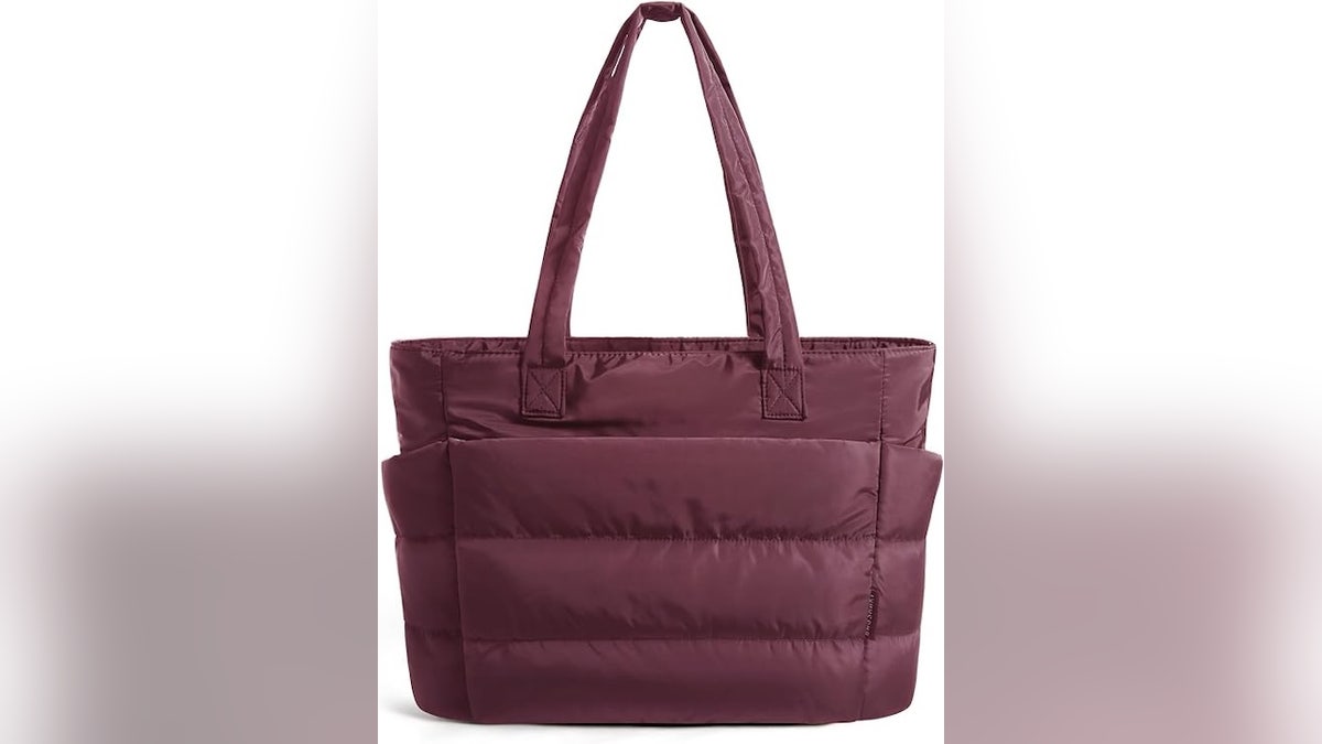 This tote fits a 15.6-inch laptop.
