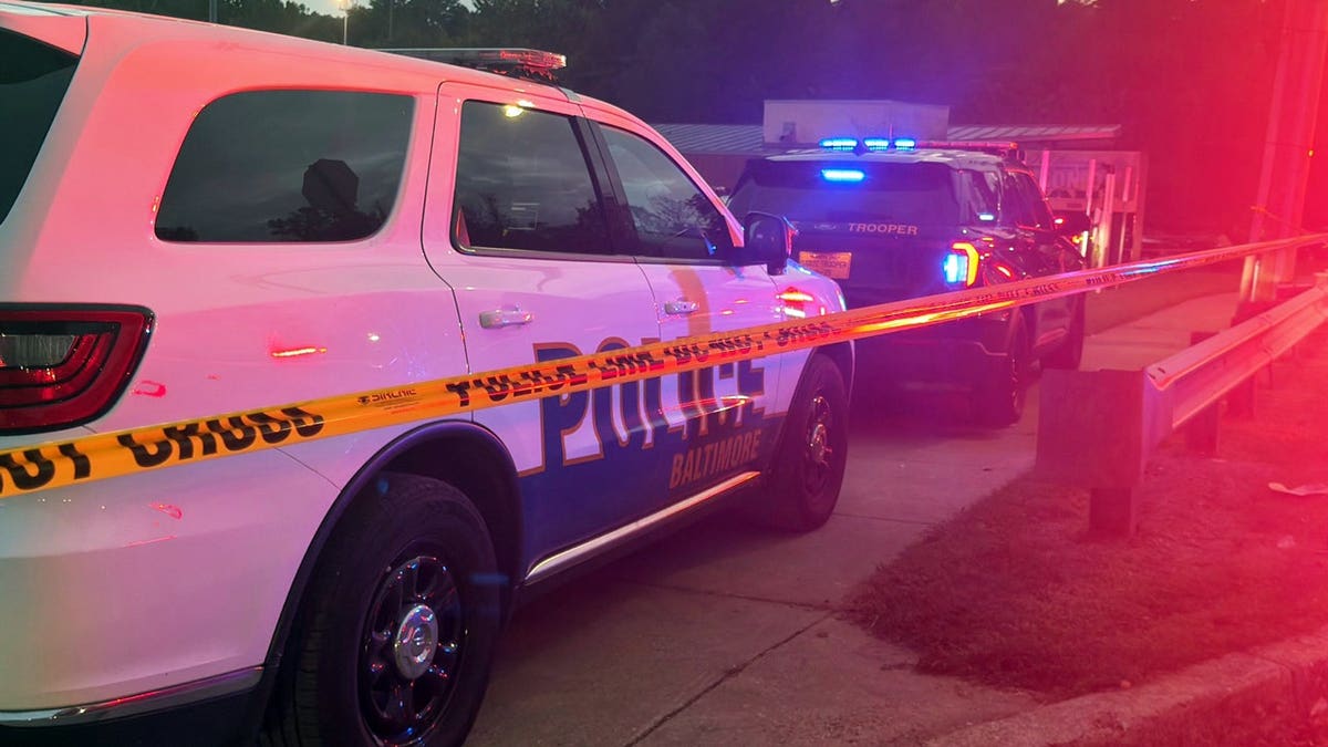 Police respond after a 12-year-old girl was killed and three adults were wounded after gunfire erupted near a youth football game at Leon Day Park in Baltimore