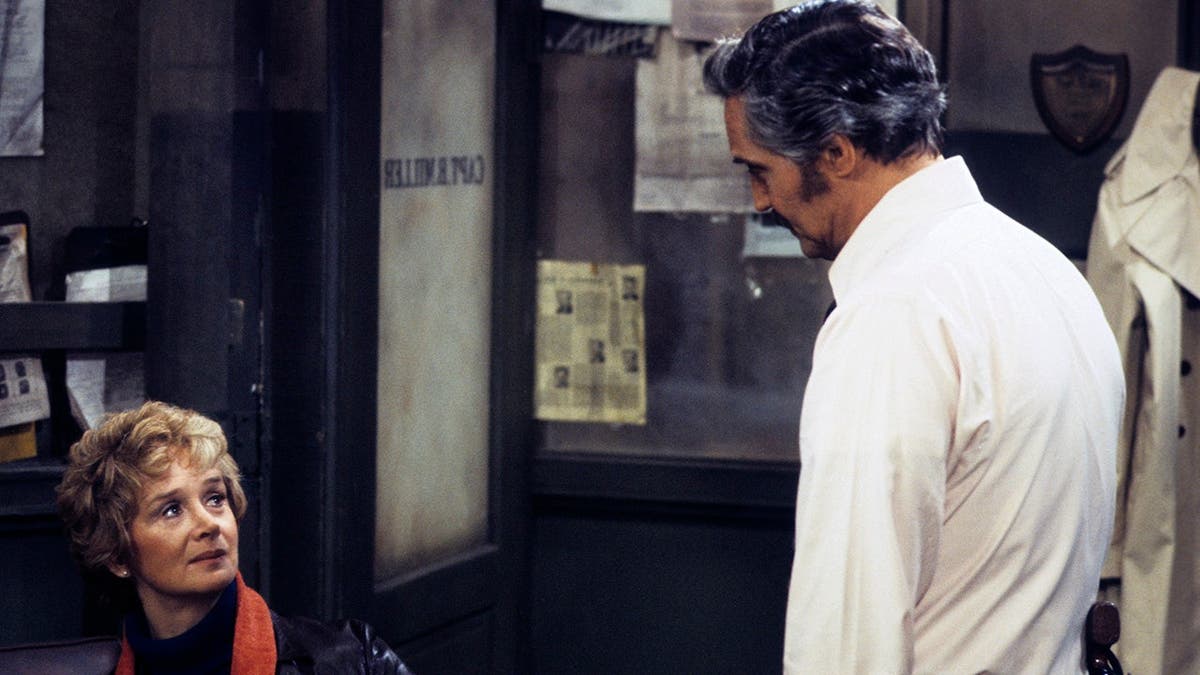 Barbara Barrie and Hal Linden in a scene from Barney Miller.