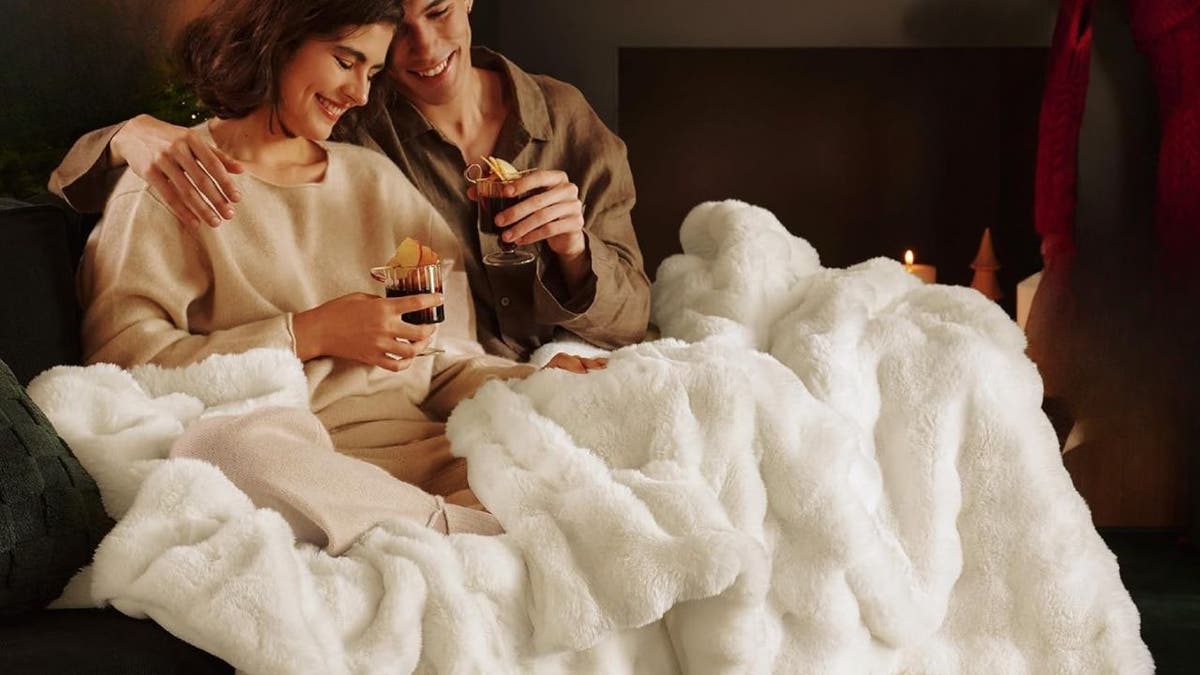 Stay warm this fall and winter with this faux fur blanket.