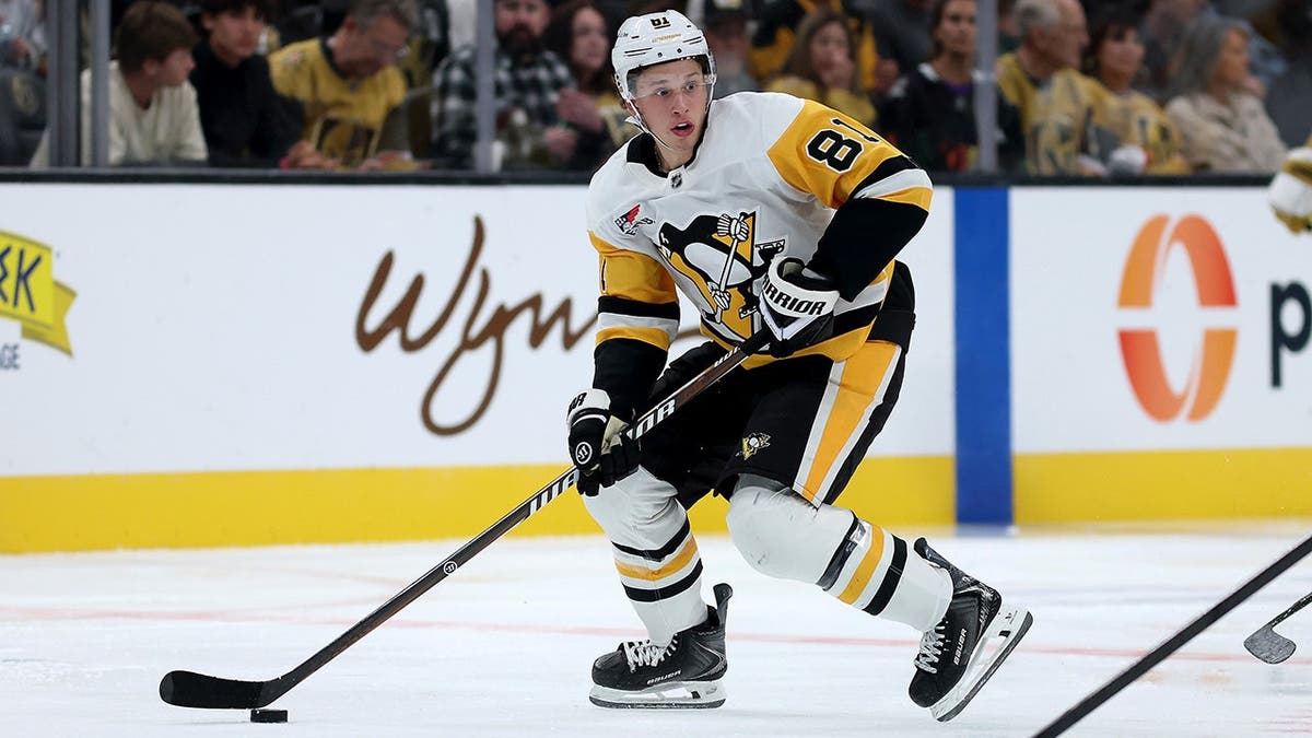 Ben Kindel skates with the puck during a game at T-Mobile Arena.