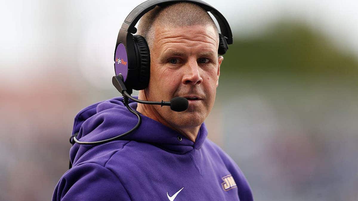 Billy Napier looks on from the sidelines during a college football game.
