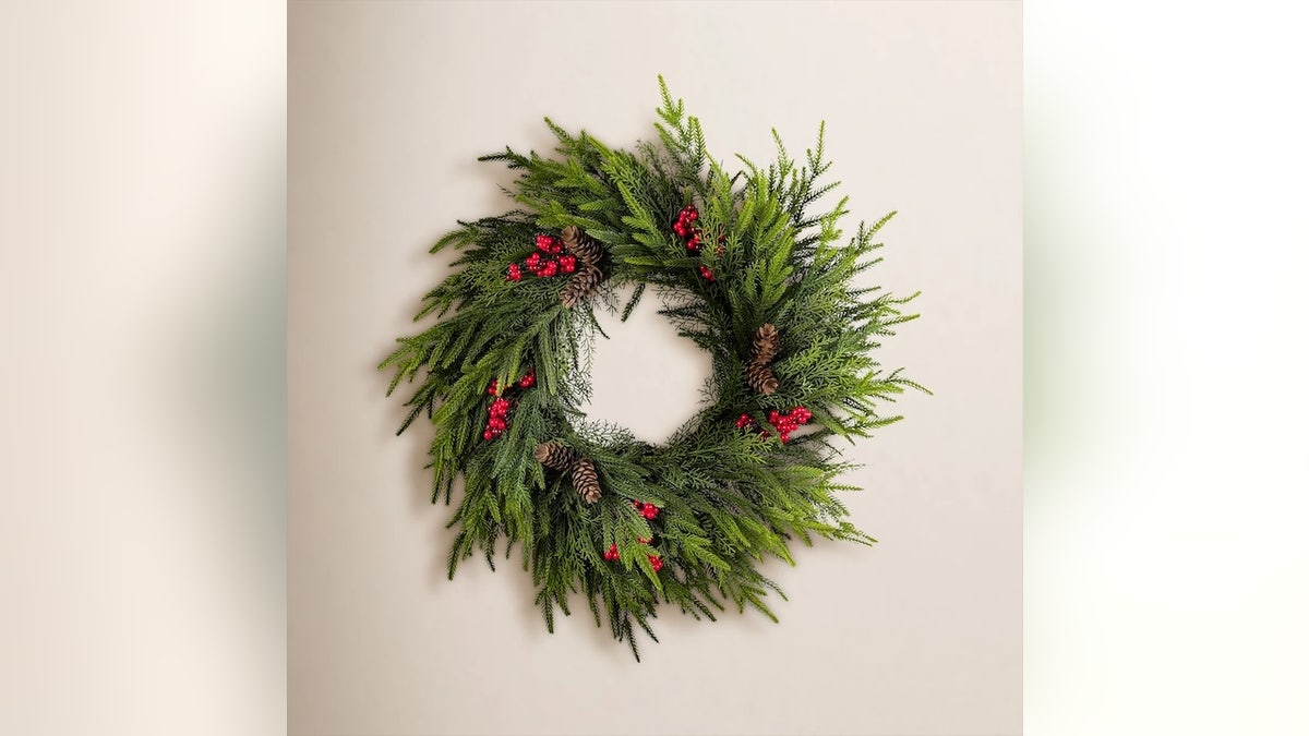 The plastic needles on this wreath feel like the real thing.