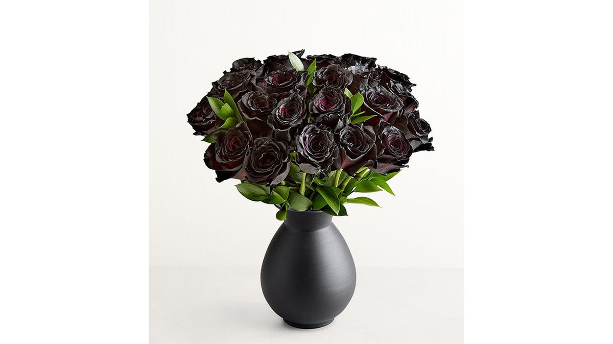 Black roses are fit for a witchy Halloween display.