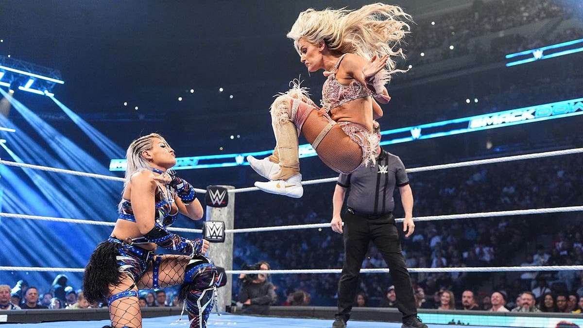Blake Monroe wrestles against Giulia during SmackDown at Ball Arena.