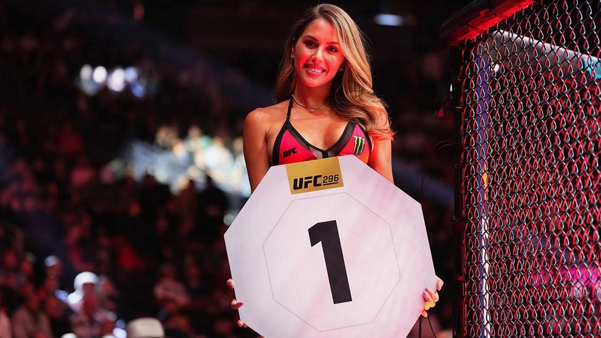Brittney Palmer announces a round during a bantamweight fight at T-Mobile Arena.