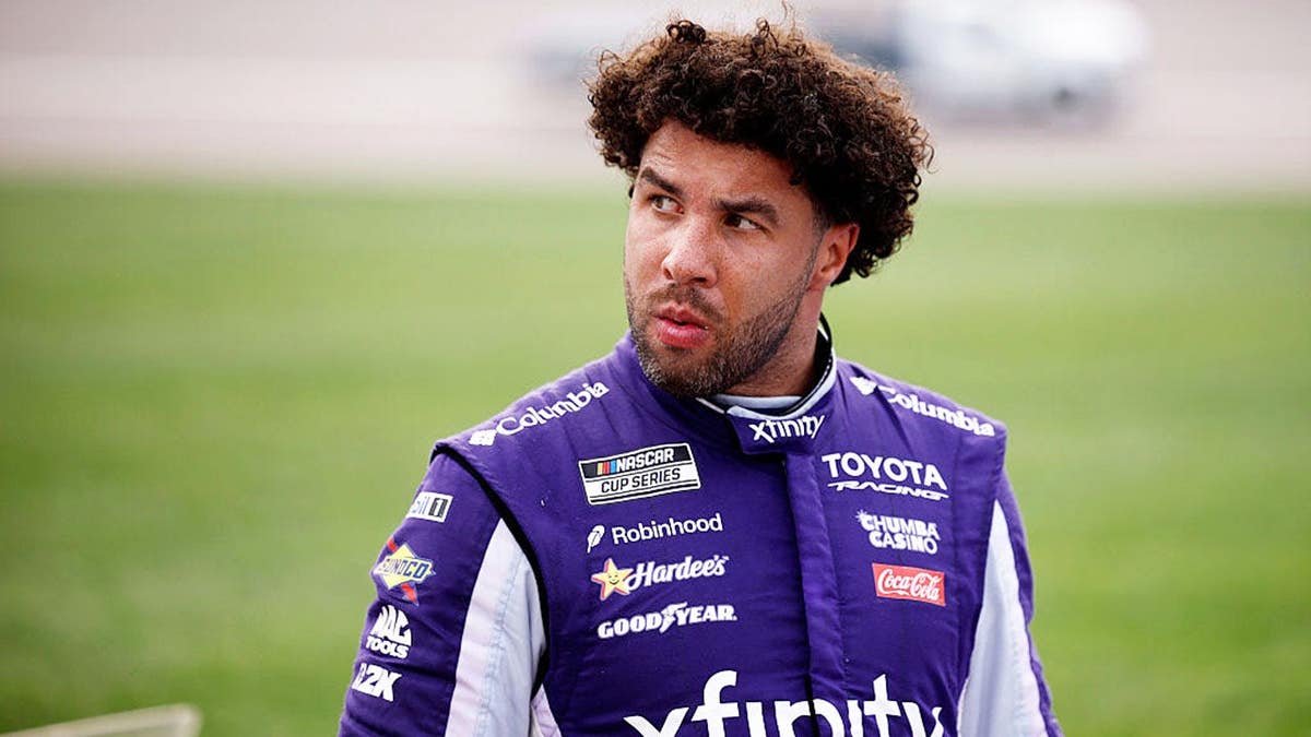 Bubba Wallace looks on after the NASCAR Cup Series race in Kansas City, Kansas.