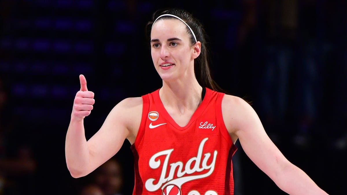 Caitlin Clark of the Indiana Fever looks on during a WNBA playoff game.