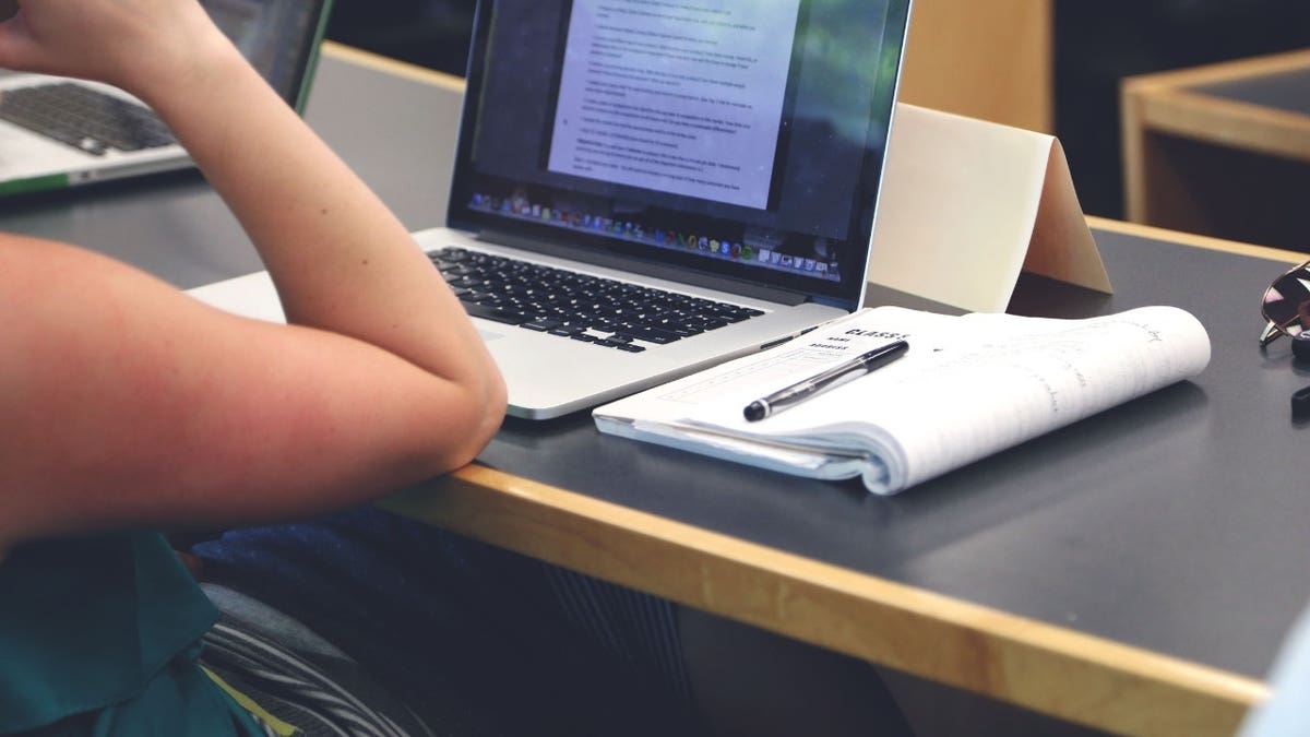 A student sitting at a desk