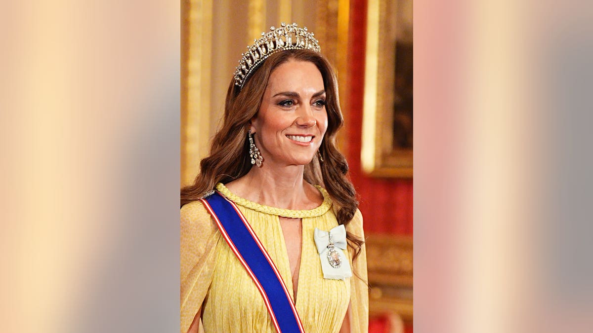 Catherine, Princess of Wales arrives at Windsor Castle for a state banquet.