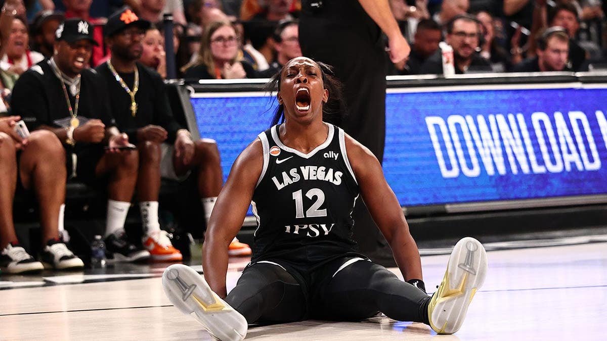 Chelsea Gray celebrates during a WNBA playoff game against the Indiana Fever in Las Vegas.