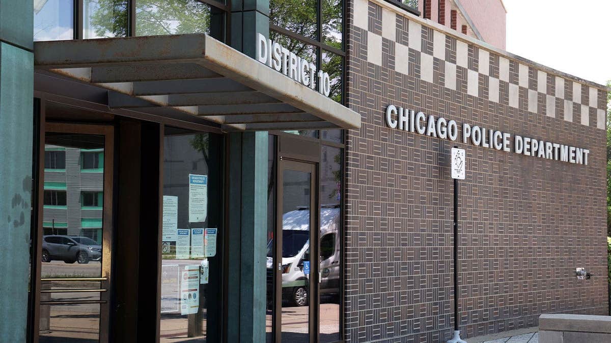 Exterior of a Chicago Police Department building with department signage above the entrance