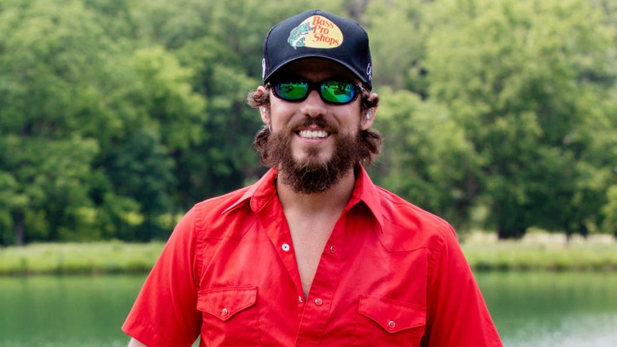 Chris Janson performs on stage at CMT Summer Sessions.