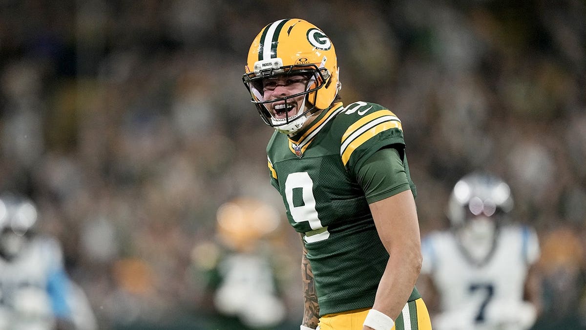 Christian Watson reacts during the game at Lambeau Field.