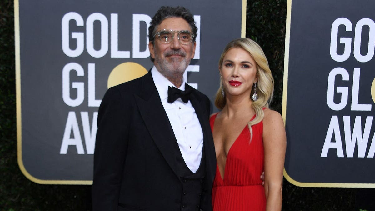 Chuck Lorre and Arielle at the Golden Globe Awards in January 2020