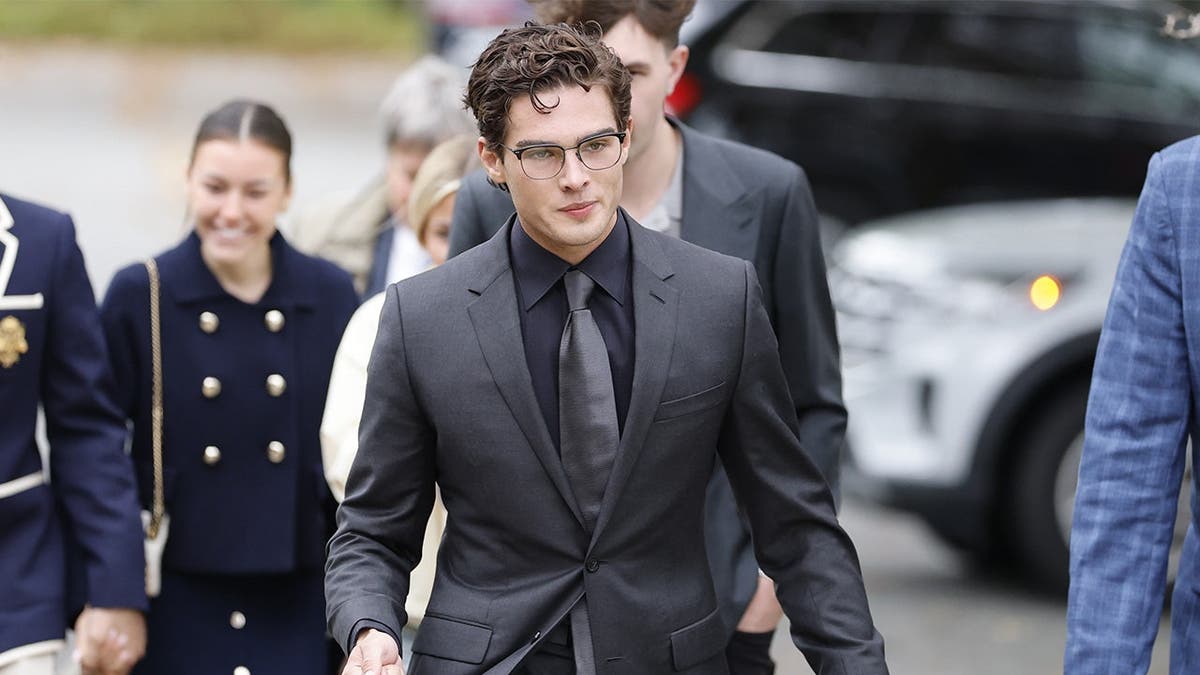 image shows defendant walking