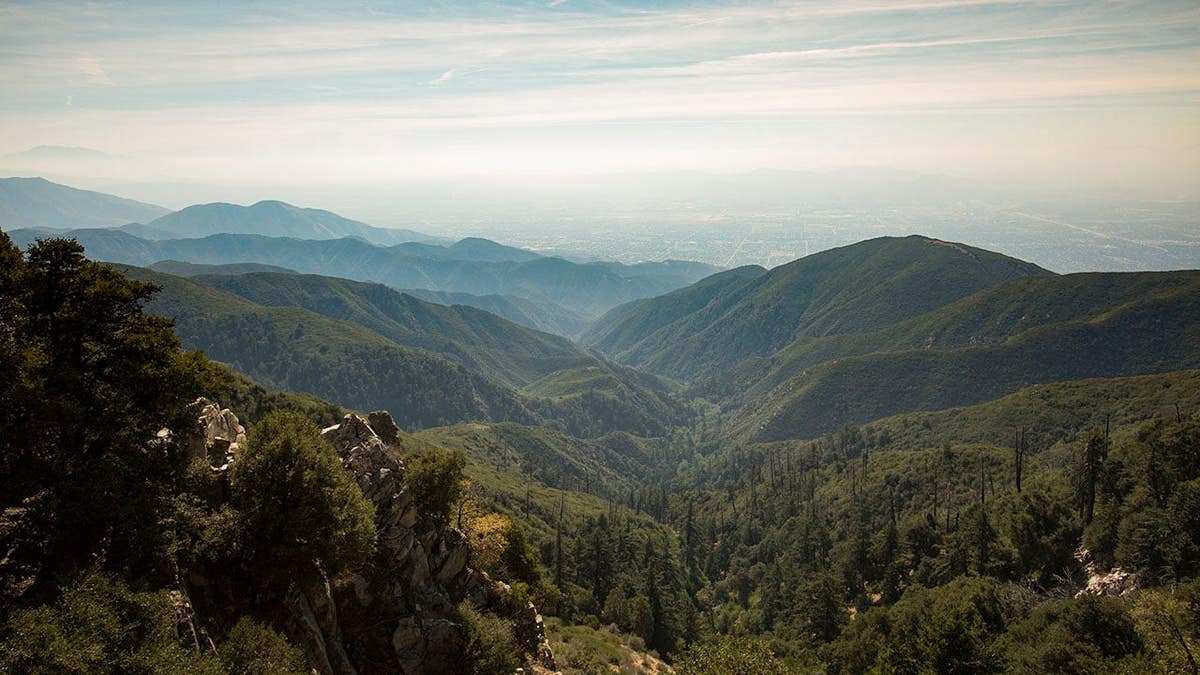 Mountains rise in daylight near San Bernardino, California.