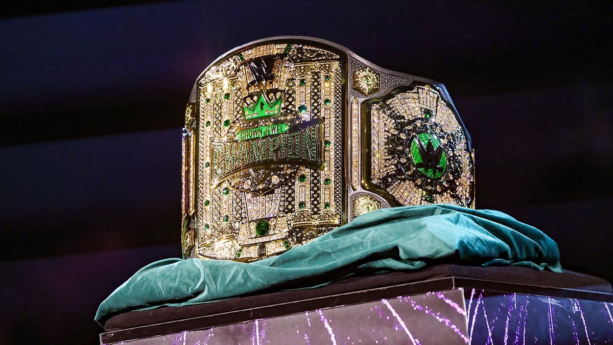 Crown Jewel Men's Championship belt displayed at Mohammed Abdo Arena in Riyadh, Saudi Arabia