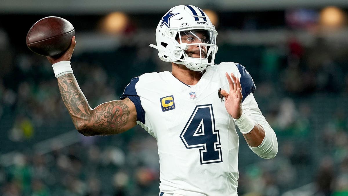 Dak Prescott warms up before an NFL game against the Philadelphia Eagles in Philadelphia.