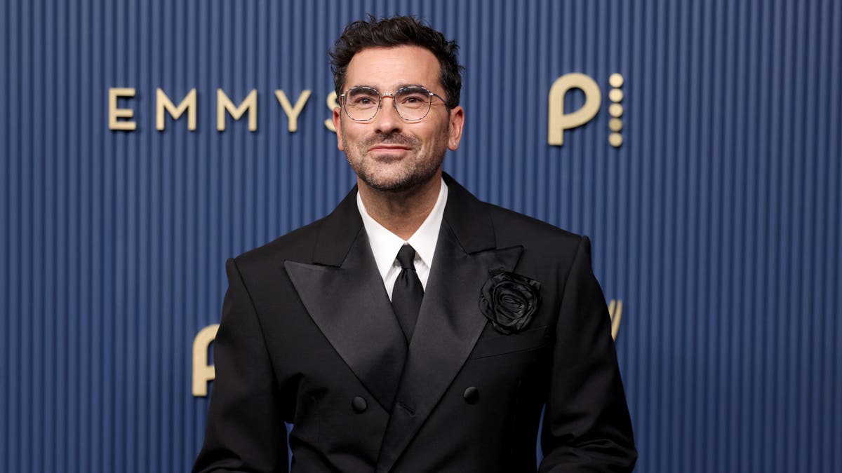 Dan Levy arrives at the 78th Primetime Emmy Awards.
