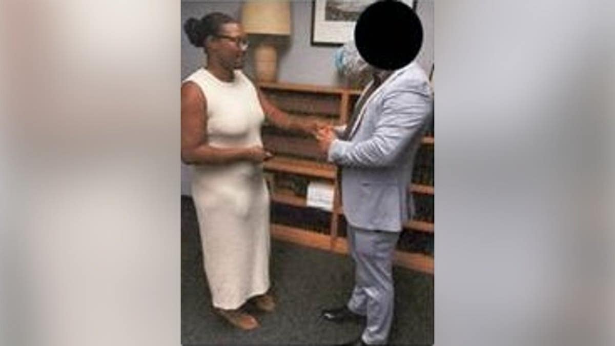 Erica Daniels, another alleged co-conspirator, marrying an illegal immigrant from Brazil.