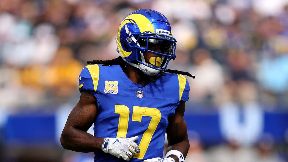 Davante Adams, wearing Los Angeles Rams jersey number 17, runs in action against the Arizona Cardinals.