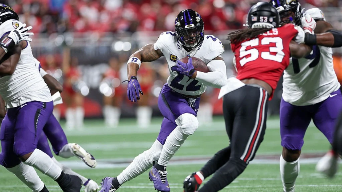 Derrick Henry runs with the ball against the Atlanta Falcons.