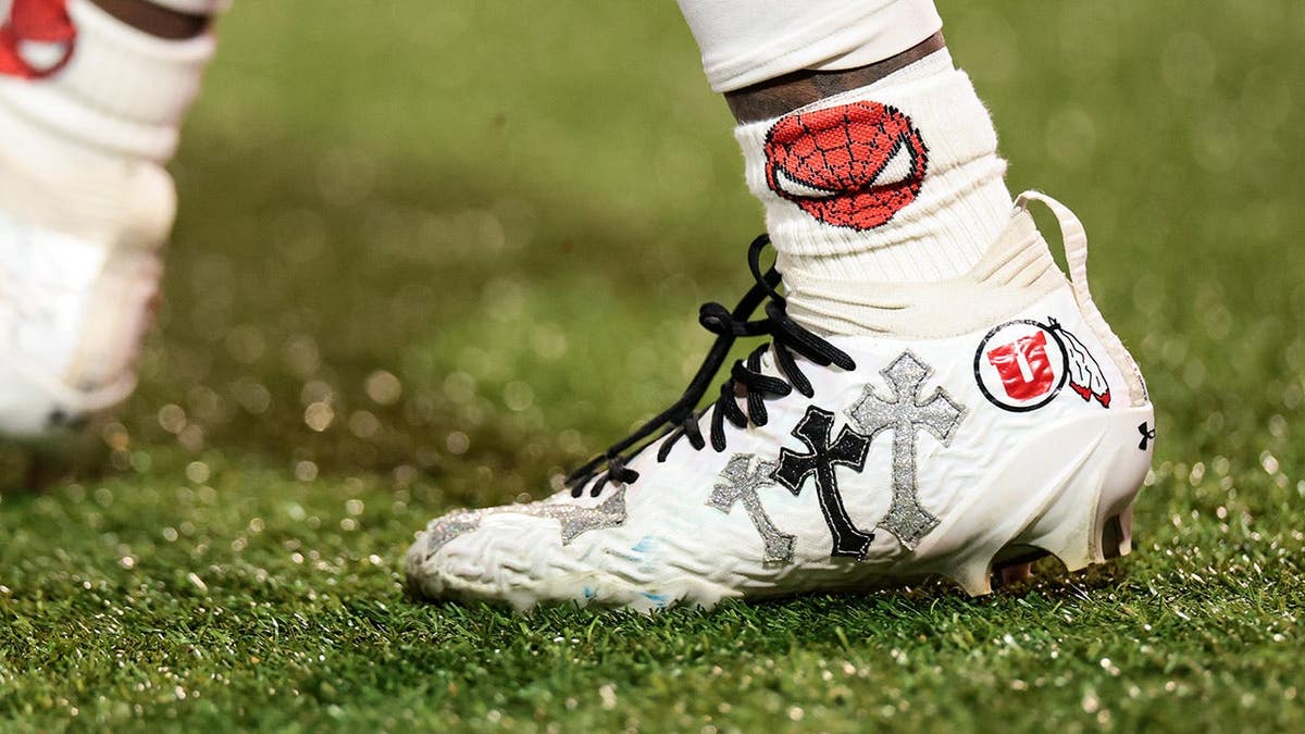 Devon Dampier's cleats shown before the Utah Utes game at Folsom Field.
