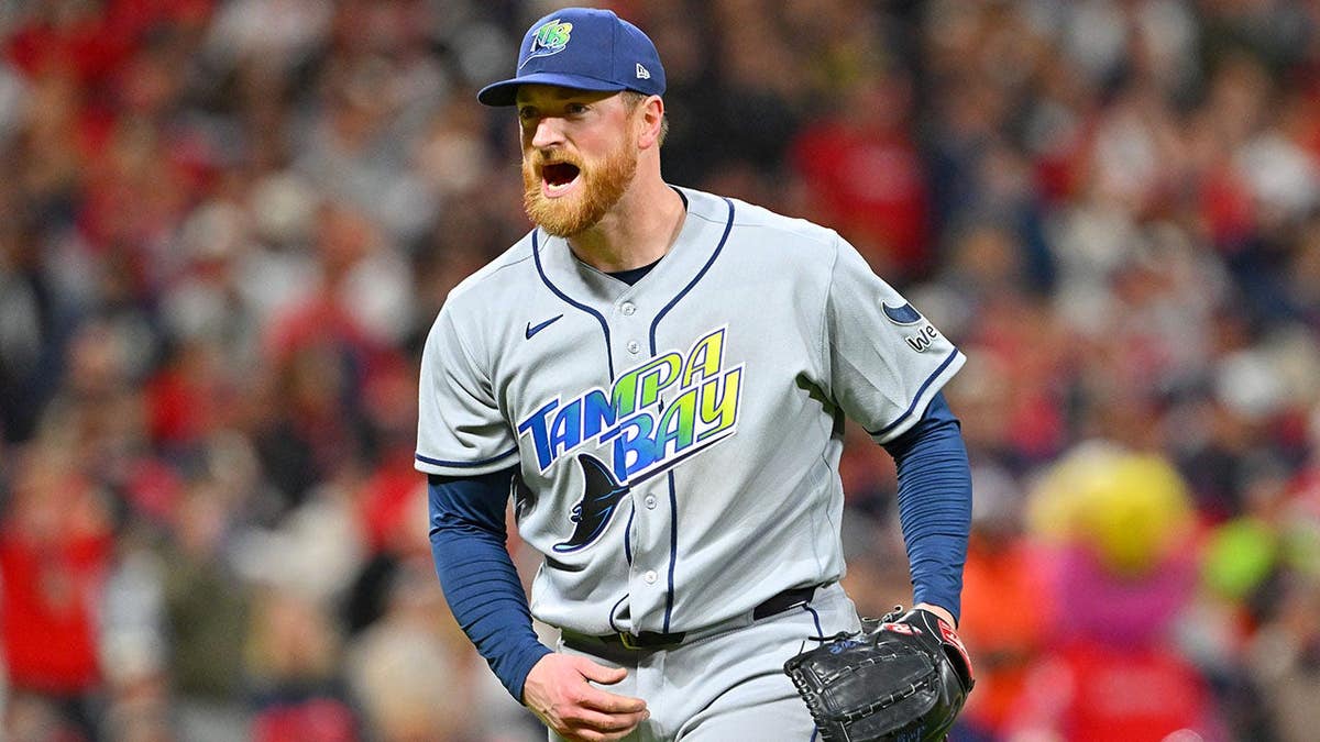 Drew Rasmussen reacts to a double play during Game 5 of the American League Championship Series.