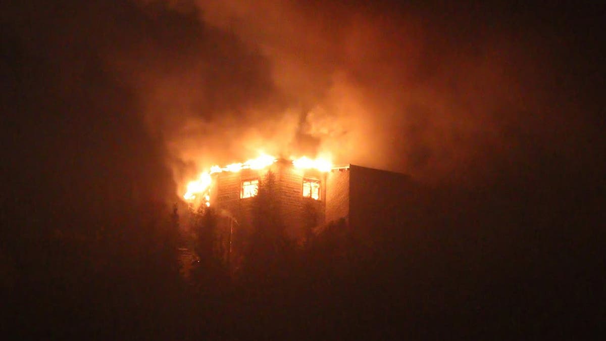 The Eagle's Nest building burns in the Bavarian Alps.