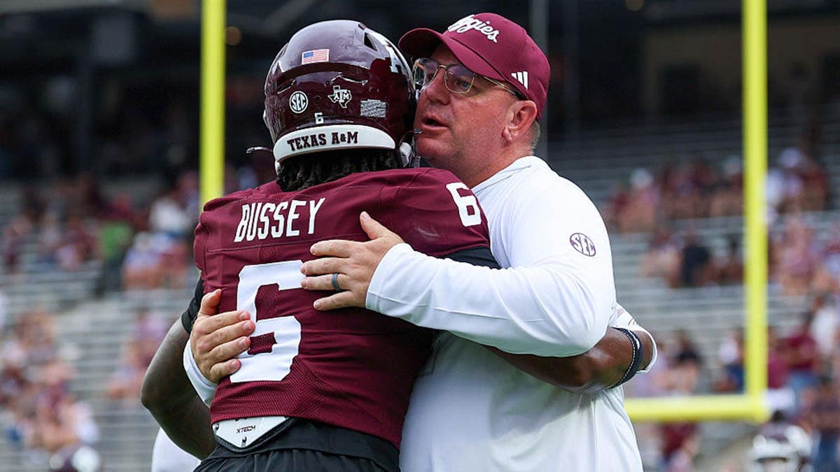 Texas A&M Aggies and head coach Mike Elko