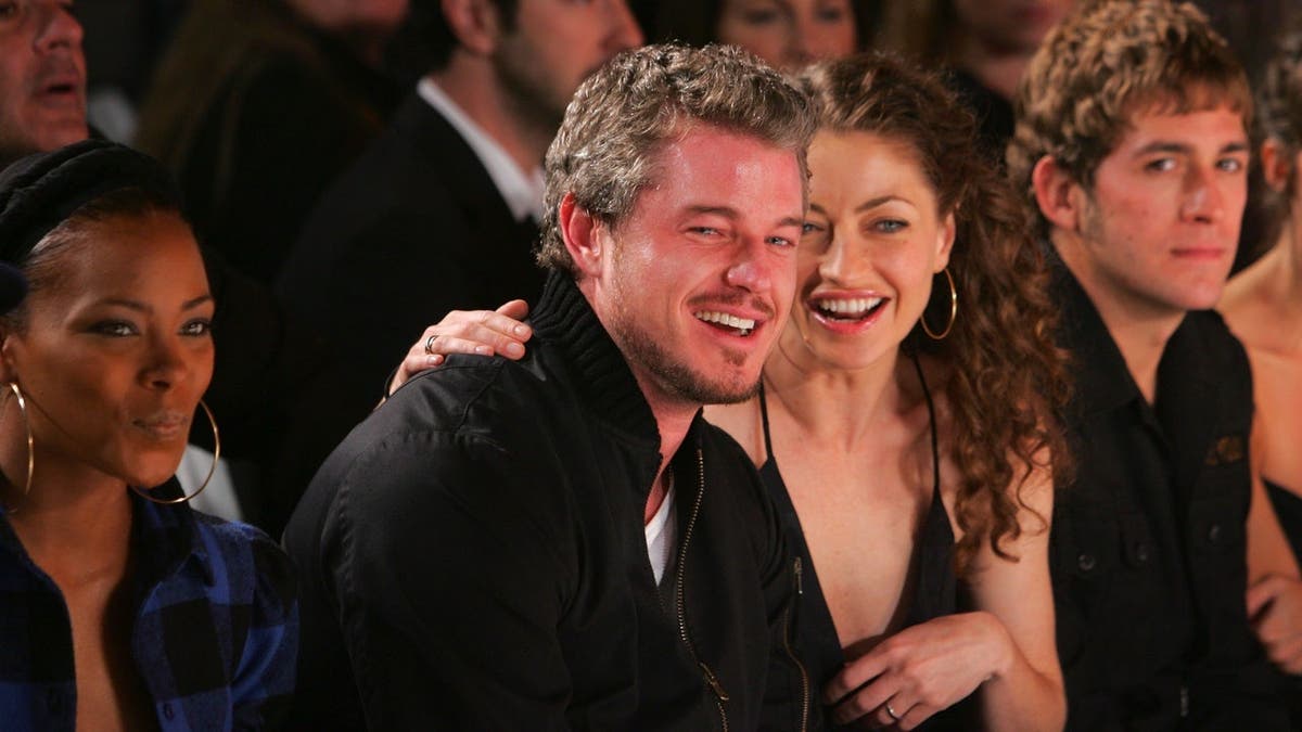 Eric Dane and Rebecca Gayheart seated in the front row at an event in Los Angeles.