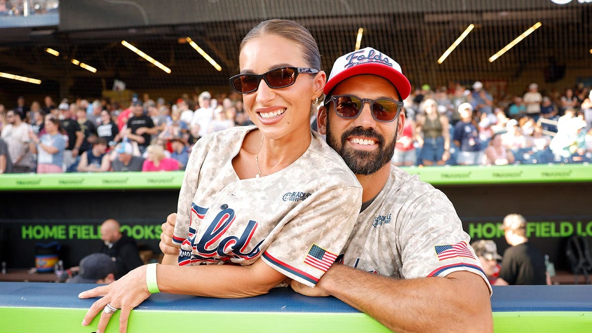 Jessie James Decker and Eric Decker attend a celebrity softball game in Nashville.