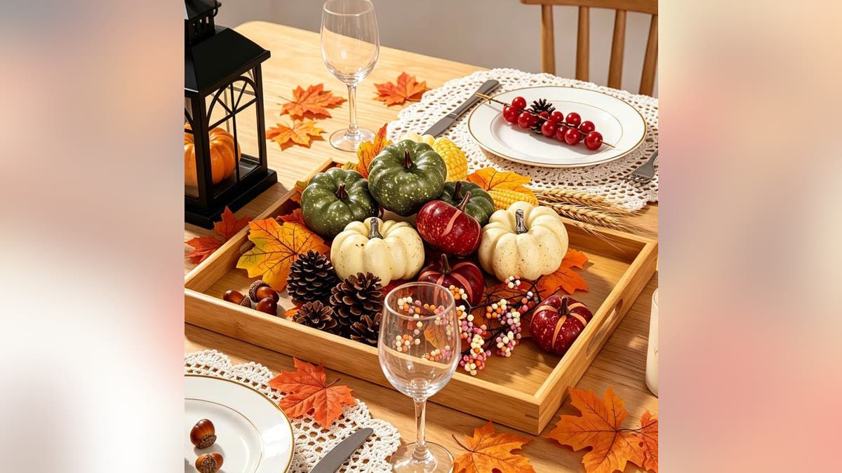 Pumpkins brighten up your table centerpiece.